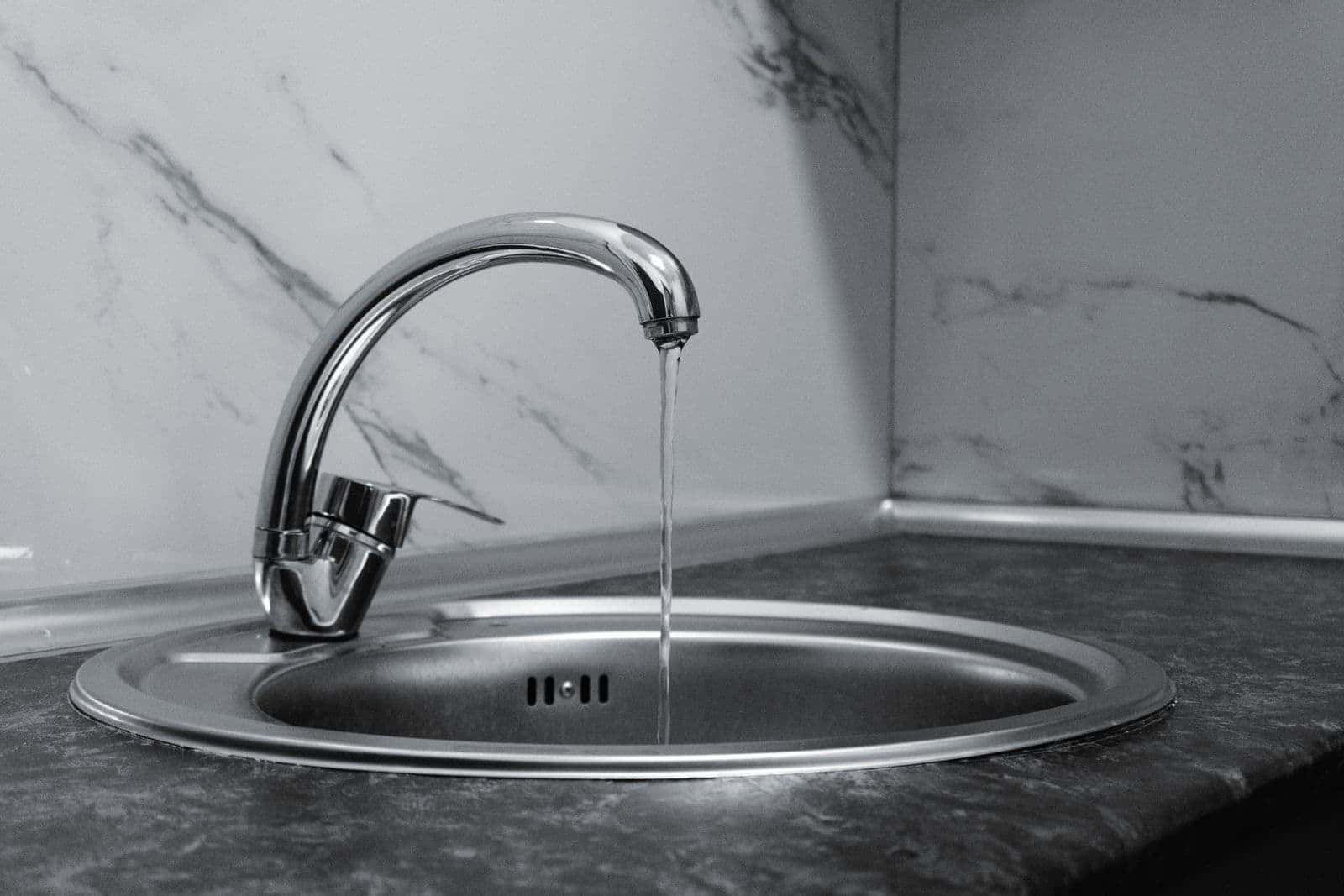 Water running from a kitchen faucet